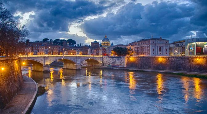 Rome travel tips - Shows a beautiful bridge at night