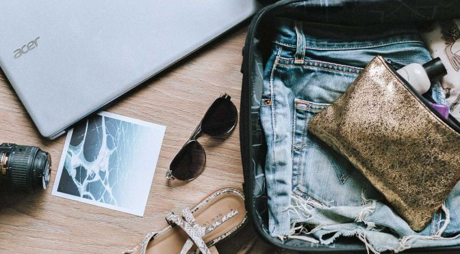 Best travel essentials for women - Shows holiday suitcase