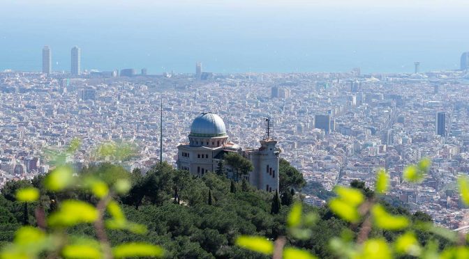 Shows a stunning viewpoint on top of Mount Tibidabo in Barcelona