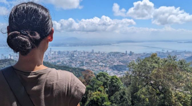 shows susie looking out at a viewpoint at Penang Hill, Malaysia